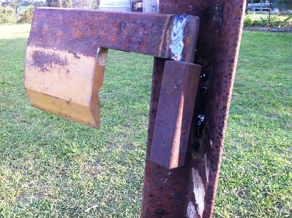 Back of post showing hinge, paddle lifts out